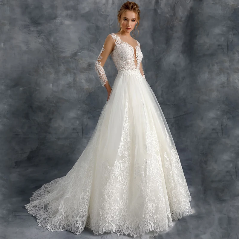 Classic A Line Appliques Long Sleeve Wedding Dress for Women Scoop Lace Court Train Bridal Gown with Button Back Robe De Mariee
Classic A Line Appliques Long Sleeve Wedding Dress for Women Scoop Lace Court Train Bridal Gown with Button Back Robe De Mariee