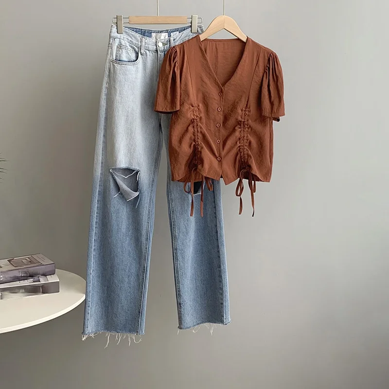 2021 Summer Chic French Style Puff Sleeve Blouse V Neck Drawstring Design Button Up Shirt Office Lady Elegant Solid Blusas Mujer
2021 Summer Chic French Style Puff Sleeve Blouse V Neck Drawstring Design Button Up Shirt Office Lady Elegant Solid Blusas Mujer