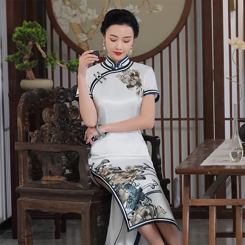 Chinese Style Female Print Flower Cheongsam Skirt 2021 Sping Summer Banquet Straight Qipao Skirt M-4XL Slim Vintage Gown
Chinese Style Female Print Flower Cheongsam Skirt 2021 Sping Summer Banquet Straight Qipao Skirt M-4XL Slim Vintage Gown