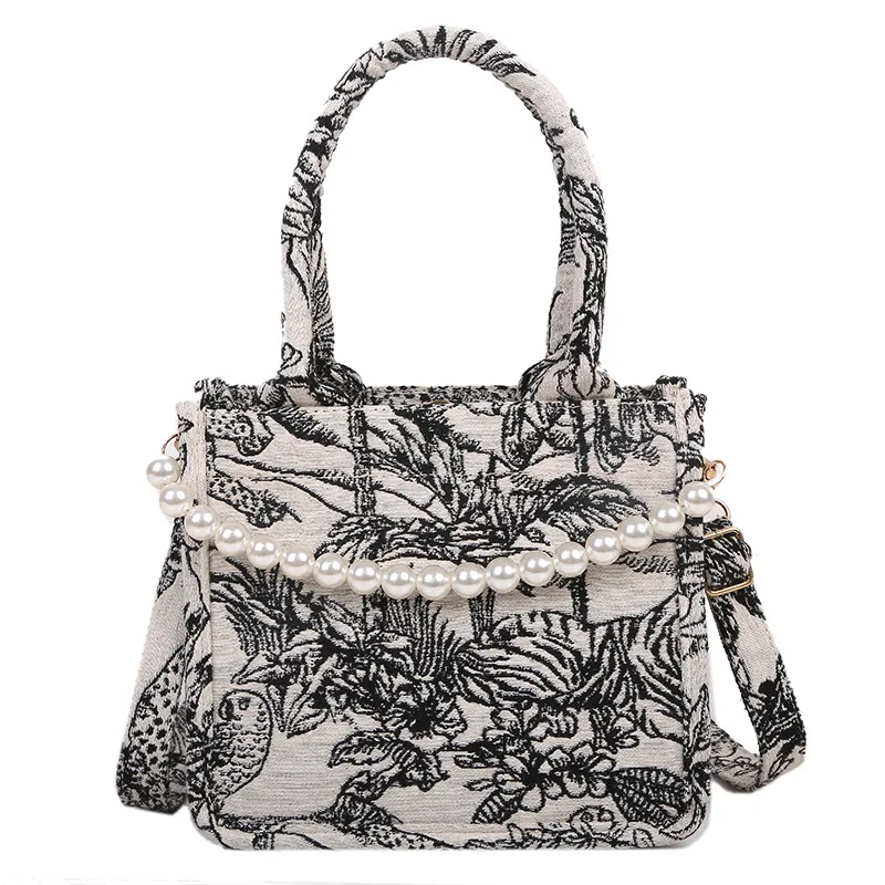 Summer new tide fashion pearl chain handbag Korean version of the shoulder ladies small bag Messenger bag
Summer new tide fashion pearl chain handbag Korean version of the shoulder ladies small bag Messenger bag