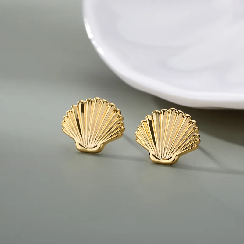 2021 New Simple Gold Color Metal Shell Shape Earrings Unique Design Fashion Earrings for Women Jewelry Bijoux Femme
2021 New Simple Gold Color Metal Shell Shape Earrings Unique Design Fashion Earrings for Women Jewelry Bijoux Femme