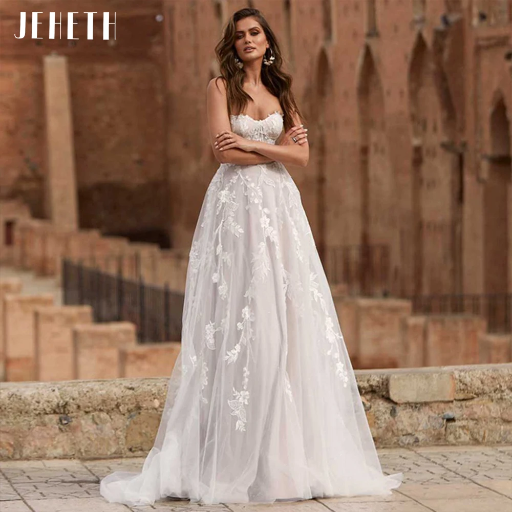 JEHETH Strapless Appliques Tulle Boho Wedding Dresses 2022 Sweetheart Appliques Lace A Line Bohemian Bridal Dress vestido de nov
JEHETH Strapless Appliques Tulle Boho Wedding Dresses 2022 Sweetheart Appliques Lace A Line Bohemian Bridal Dress vestido de nov
