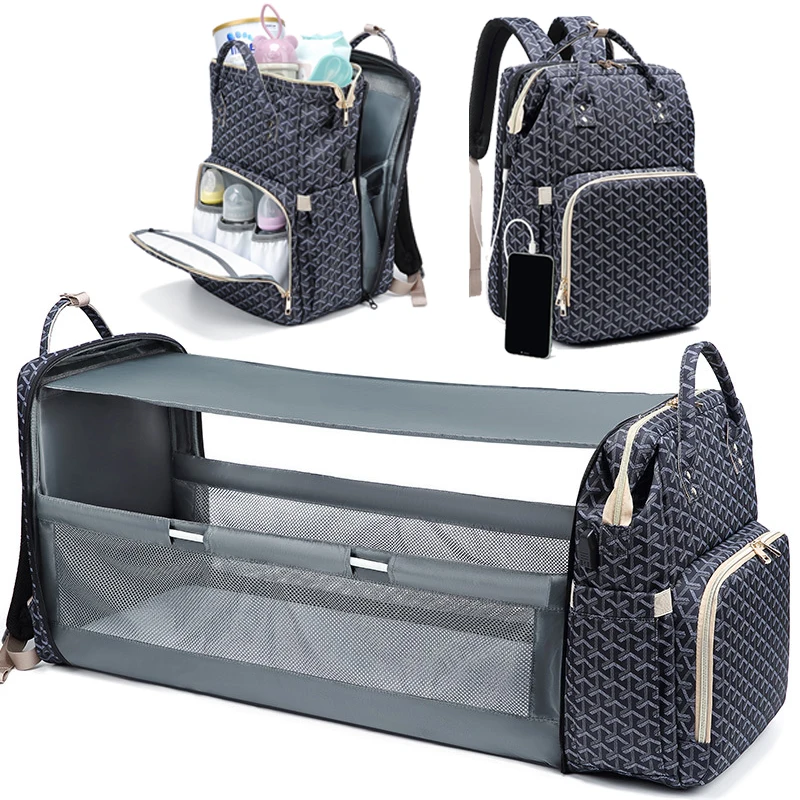 High quality multifunctional portable foldable diaper bag mother travel big backpack crib diaper changing mat for outdoor use
High quality multifunctional portable foldable diaper bag mother travel big backpack crib diaper changing mat for outdoor use