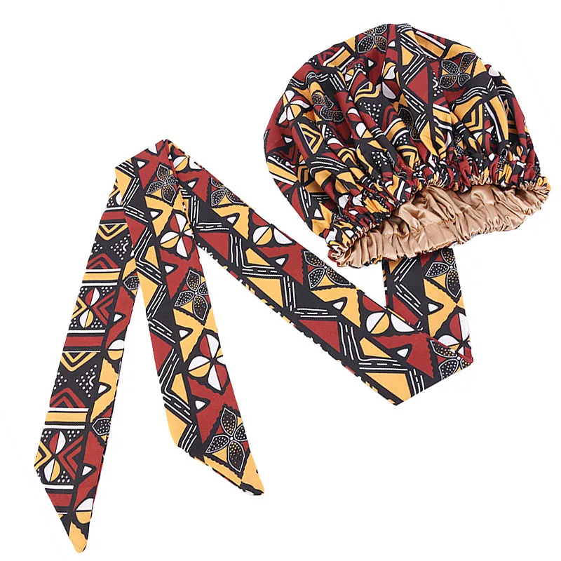 New African Print Satin Bonnet Headwrap In Women's Hair With Long Ribbon Wrap Double Layer Headwrap Ankara Hair Wrap Accessories
New African Print Satin Bonnet Headwrap In Women's Hair With Long Ribbon Wrap Double Layer Headwrap Ankara Hair Wrap Accessories