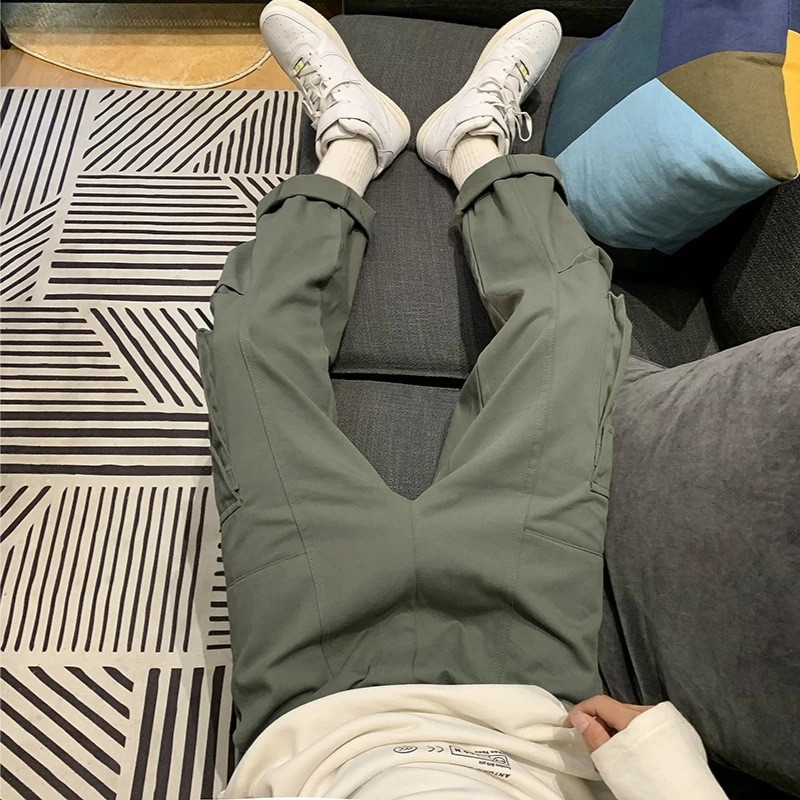 Men Casual Pants Cargo Pockets Loose Fashion Autumn Winter Trousers Harajuku Korean Style Ulzzang New Brand Chic Bottoms 2021
Men Casual Pants Cargo Pockets Loose Fashion Autumn Winter Trousers Harajuku Korean Style Ulzzang New Brand Chic Bottoms 2021