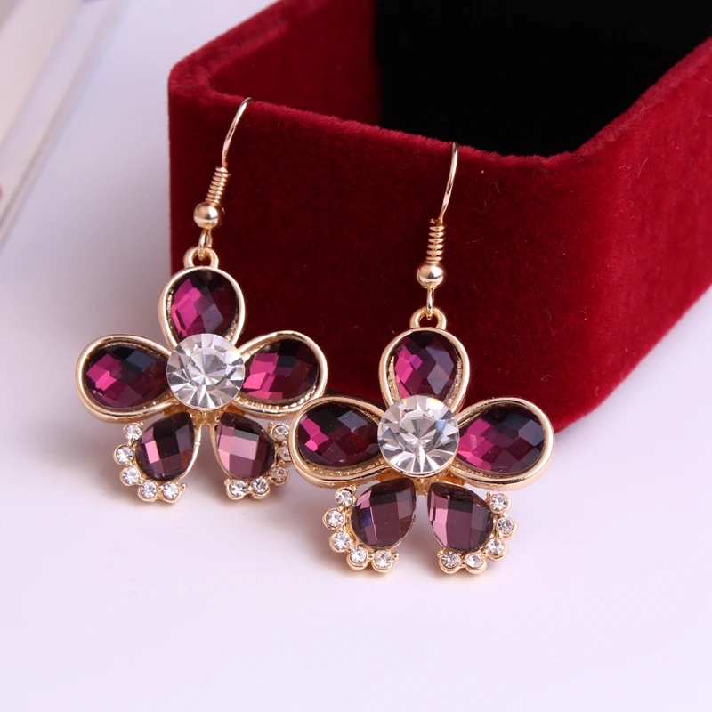 UNNAIER Bohemian personality Flowers Fuchsia Semi-precious stones earring Female Prevent allergy Rhinestone Ear jewelry
UNNAIER Bohemian personality Flowers Fuchsia Semi-precious stones earring Female Prevent allergy Rhinestone Ear jewelry