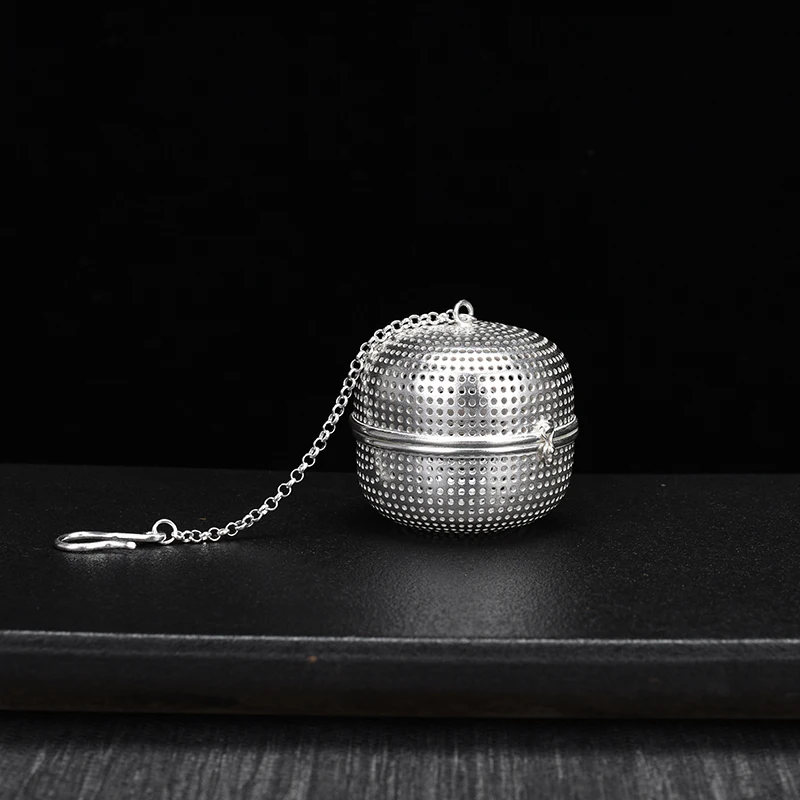 New S999 Silver Ball Tea Dip Net Filter with Hook Loose Tea Spice Ball with Rope Chain Home Kitchen Tools
New S999 Silver Ball Tea Dip Net Filter with Hook Loose Tea Spice Ball with Rope Chain Home Kitchen Tools