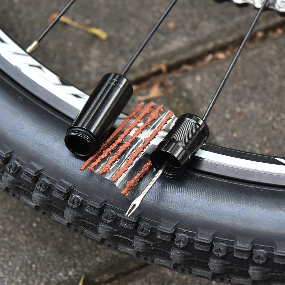 Bicycle Tubeless Tire Repair Kit MTB Tyre Puncture Sealant Rubber Stripes Road Bike Tire Maintenance Mini Bicycle Tools 
Bicycle Tubeless Tire Repair Kit MTB Tyre Puncture Sealant Rubber Stripes Road Bike Tire Maintenance Mini Bicycle Tools