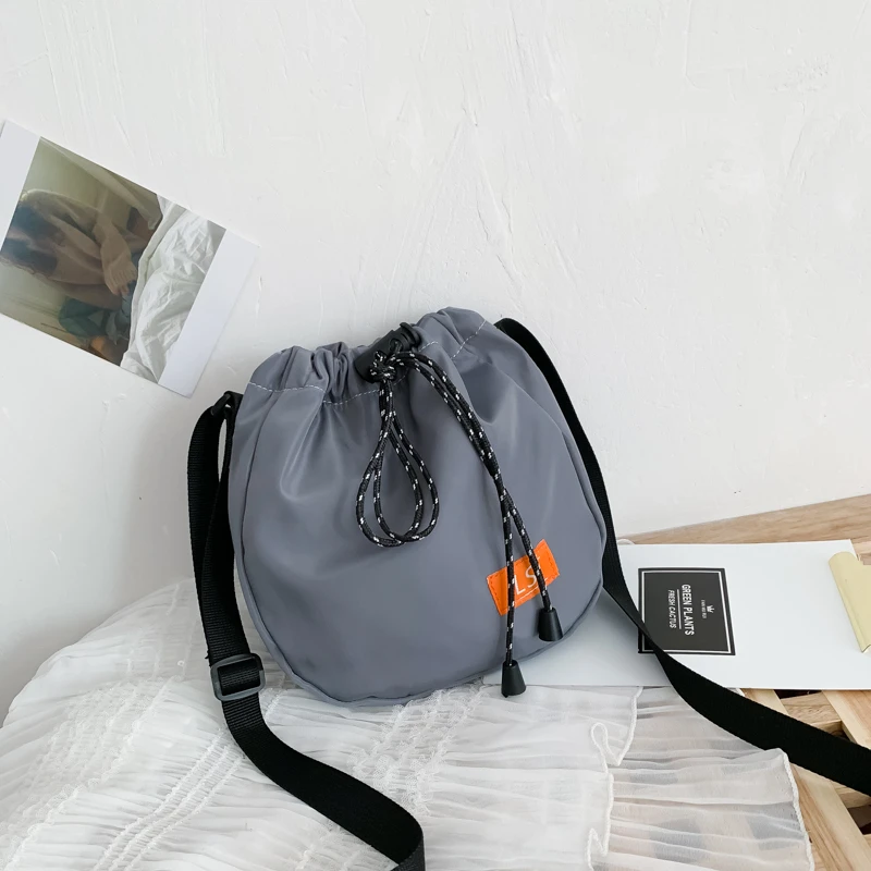 5 Color Women Shoulder Bag Fashion Pure Color Casual Tote Outdoor Bag Nylon Handbag Drawstring Messenger Bags Sac Main Femme
5 Color Women Shoulder Bag Fashion Pure Color Casual Tote Outdoor Bag Nylon Handbag Drawstring Messenger Bags Sac Main Femme