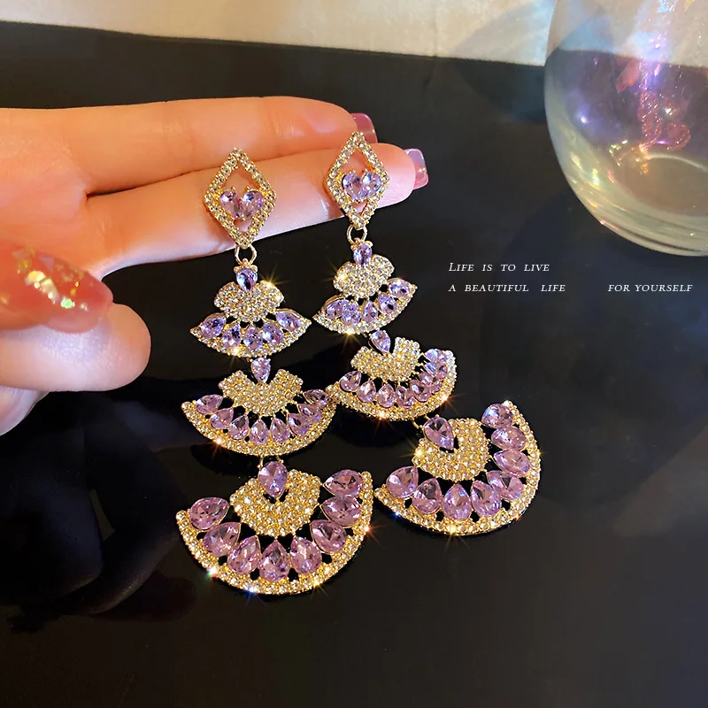 New personality retro long purple fan-shaped S925 silver needle earrings female exaggerated temperament wild earrings
New personality retro long purple fan-shaped S925 silver needle earrings female exaggerated temperament wild earrings