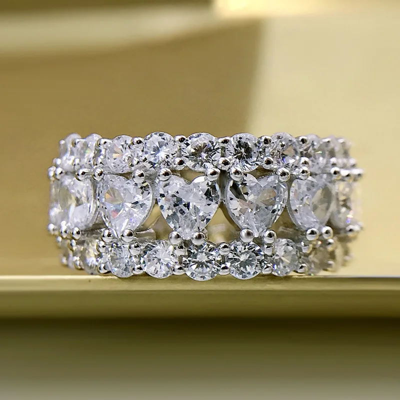 Hollow Out Heart Created Moissanite Diamond Ring 925 Sterling Silver Sparkling 1 Row Rings For Women Engagement Fine Jewelry
Hollow Out Heart Created Moissanite Diamond Ring 925 Sterling Silver Sparkling 1 Row Rings For Women Engagement Fine Jewelry