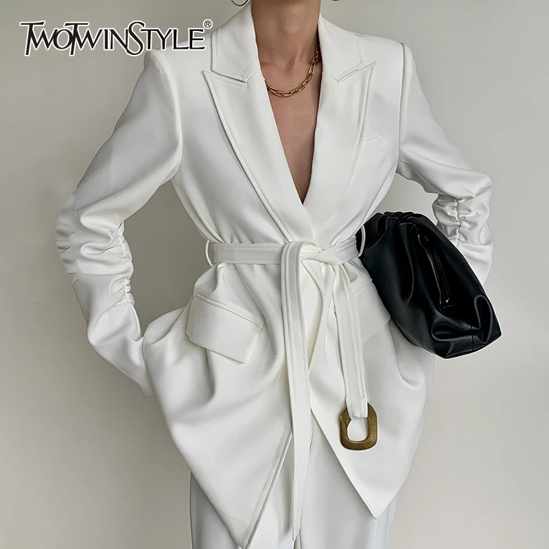Женский свободный пиджак TWOTWINSTYLE, однотонный пиджак составного кроя с отложным воротником, длинными рукавами, поясом и карманами на лето 2019
Женский свободный пиджак TWOTWINSTYLE, однотонный пиджак составного кроя с отложным воротником, длинными рукавами, поясом и карманами на лето 2019