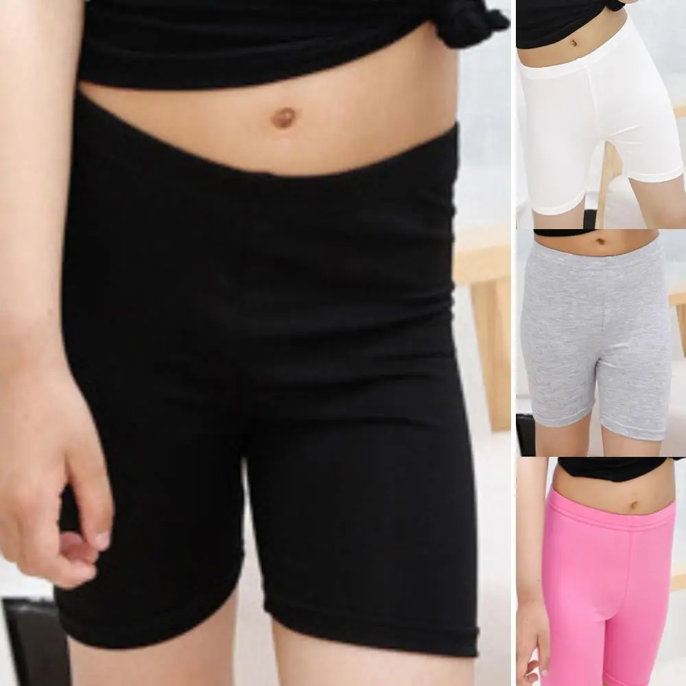 Kids Girls Skinny Knee Length Safety Shorts Solid Color Summer Stretch Short Pants Underwear 
Kids Girls Skinny Knee Length Safety Shorts Solid Color Summer Stretch Short Pants Underwear