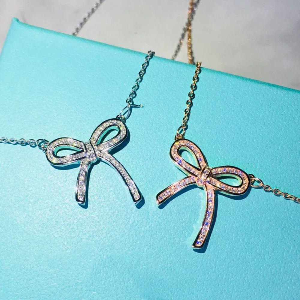 WPB Real925 ожерелья высокого качества 1:1 логотип сверкающее ожерелье с бантом ААА тиф Роскошные ювелирные изделия женский бренд горячая распро...
WPB Real925 ожерелья высокого качества 1:1 логотип сверкающее ожерелье с бантом ААА тиф Роскошные ювелирные изделия женский бренд горячая распро...