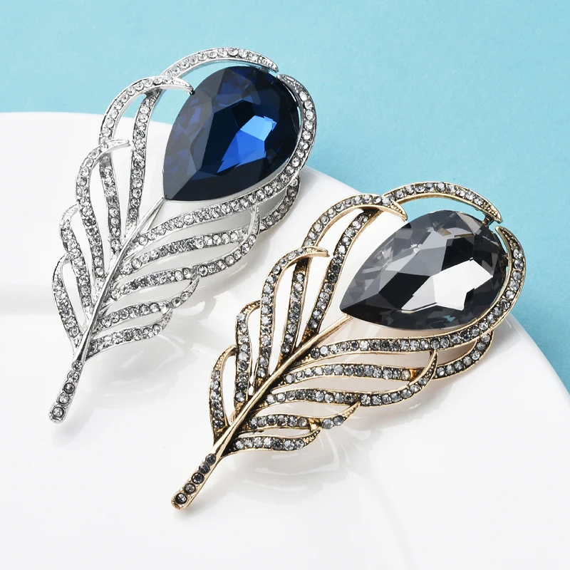 Wuli&baby Sparkling Crystal Feather Brooch Pins For Women Jewelry Gift Big Water Drop Rhinestone Brooches 2021
Wuli&baby Sparkling Crystal Feather Brooch Pins For Women Jewelry Gift Big Water Drop Rhinestone Brooches 2021