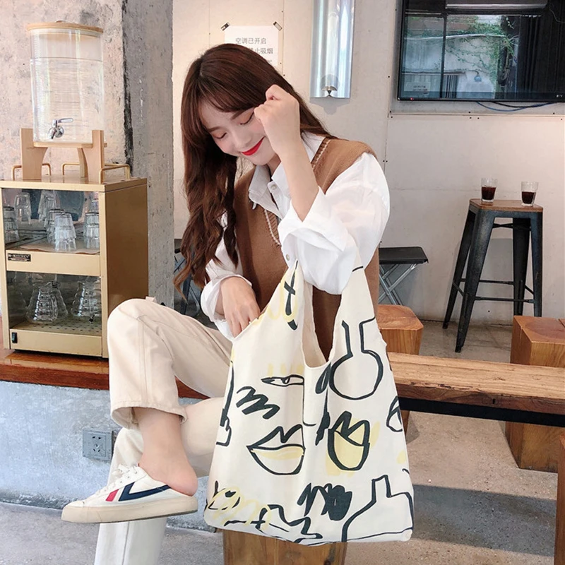 Female 2021 INS Simple Graffiti Line Shoulder Bag Popular Durable Canvas Bags Schoolgirl Large Capacity Shopping Handbag
Female 2021 INS Simple Graffiti Line Shoulder Bag Popular Durable Canvas Bags Schoolgirl Large Capacity Shopping Handbag