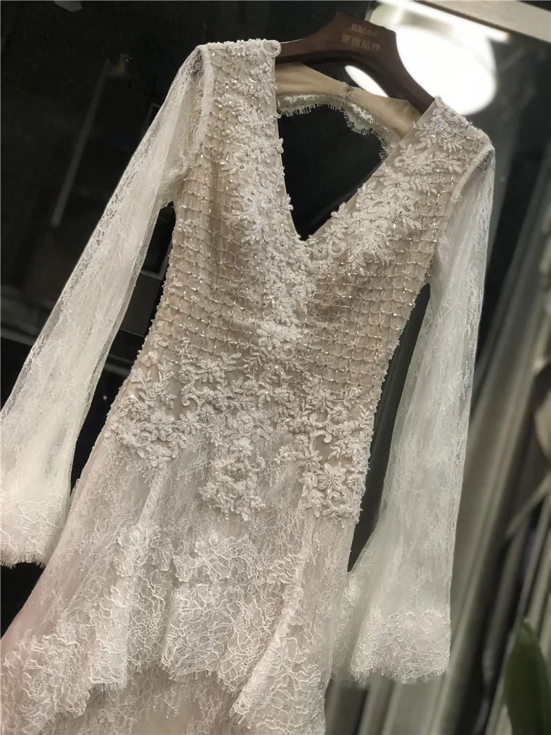 2021 Newest High Quality Real Picures V-Neck Lace Beads Full Sleeves Open Back Zipper Floor Length Sweep Train Wedding Dresses
2021 Newest High Quality Real Picures V-Neck Lace Beads Full Sleeves Open Back Zipper Floor Length Sweep Train Wedding Dresses