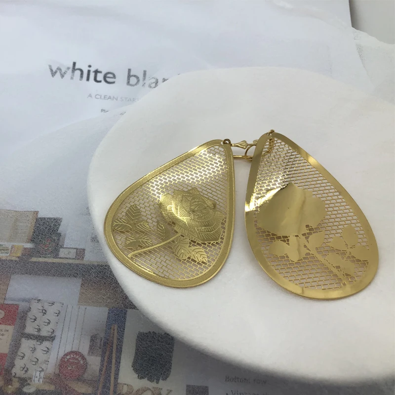 learance Orphan Yellow Gold Color Women's Rose Hollow Fan-shaped Exaggerated Earrings
learance Orphan Yellow Gold Color Women's Rose Hollow Fan-shaped Exaggerated Earrings