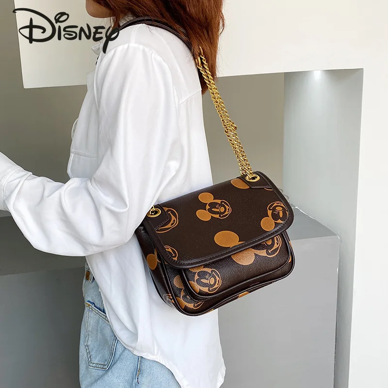 Новая женская сумка через плечо Disney 2022 с Микки Маусом, роскошная Брендовая женская сумка, модная универсальная сумка-мессенджер большой вме... 
Новая женская сумка через плечо Disney 2022 с Микки Маусом, роскошная Брендовая женская сумка, модная универсальная сумка-мессенджер большой вме...
