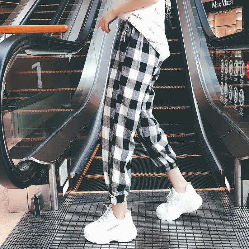 New Fashion Women Autumn Casual Pants Clothes Black White Plaid Female Harem Pants Loose Drawstring Pants Clothing
New Fashion Women Autumn Casual Pants Clothes Black White Plaid Female Harem Pants Loose Drawstring Pants Clothing