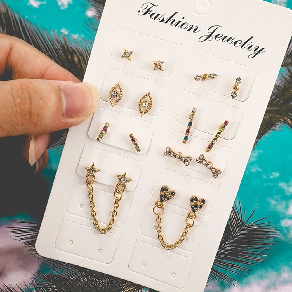 8 Pair Women Simple Cute Colorful Rhinestones Bone Eye Geometric Earring Chain Pendant Stud Ear 
8 Pair Women Simple Cute Colorful Rhinestones Bone Eye Geometric Earring Chain Pendant Stud Ear