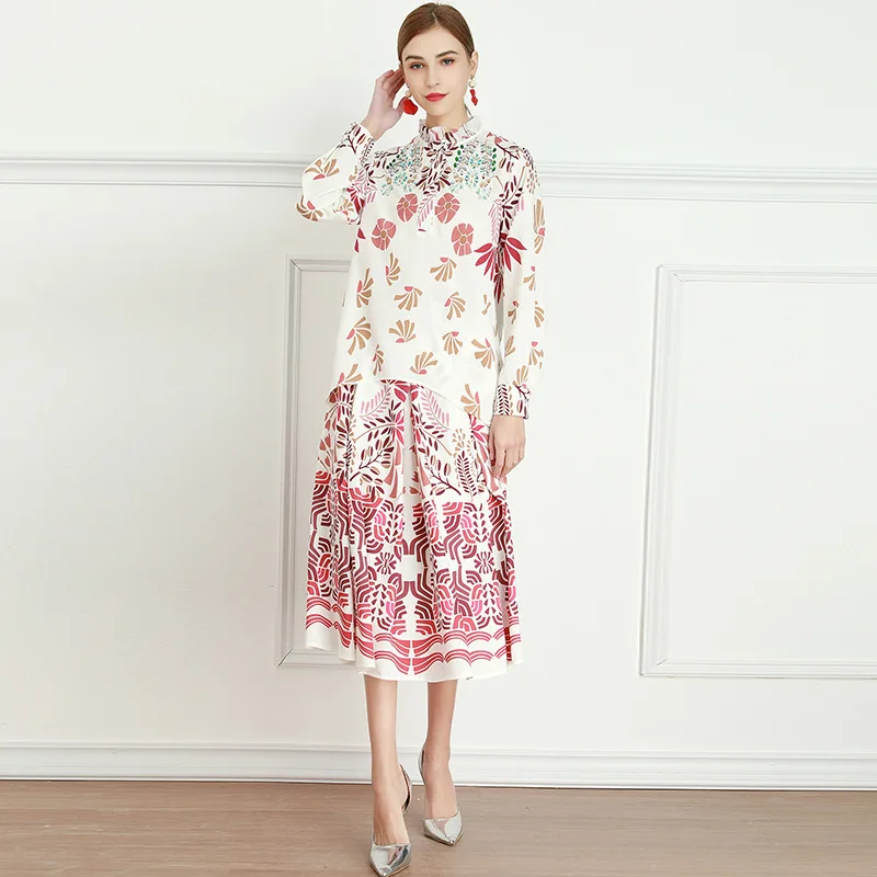 2021 spring new vertical collar stitching belt waist Flower Print Long Sleeve elegant temperament Jumpsuit mid long skirt
2021 spring new vertical collar stitching belt waist Flower Print Long Sleeve elegant temperament Jumpsuit mid long skirt