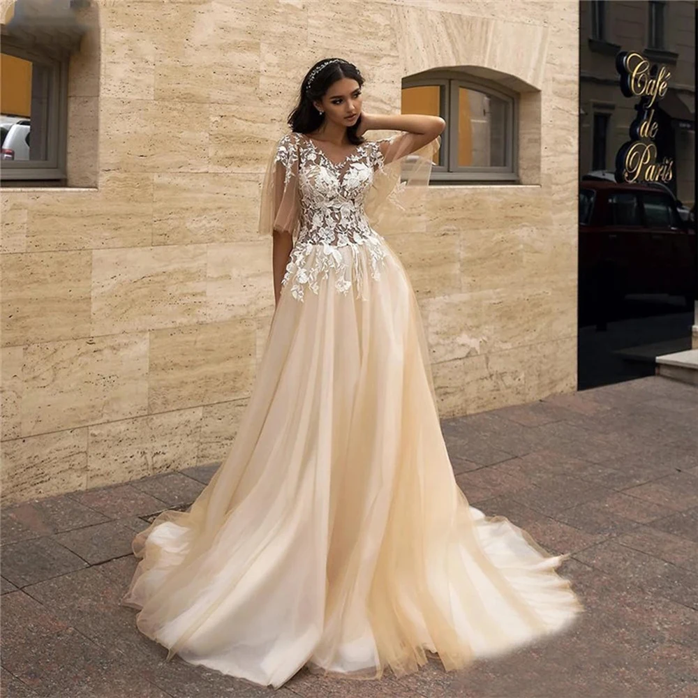 V-Neck A-Line Wedding Dresses Lace Appliques Backless Bridal Gowns 2020 European Fashion Champagne Church Women Robe De Mariee
V-Neck A-Line Wedding Dresses Lace Appliques Backless Bridal Gowns 2020 European Fashion Champagne Church Women Robe De Mariee