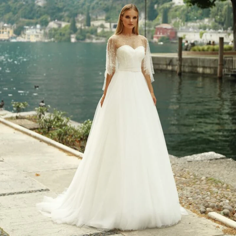 Модные богемные пляжные свадебные платья трапециевидной формы с бисером, куртка из двух частей, свадебные платья в стиле бохо
Модные богемные пляжные свадебные платья трапециевидной формы с бисером, куртка из двух частей, свадебные платья в стиле бохо