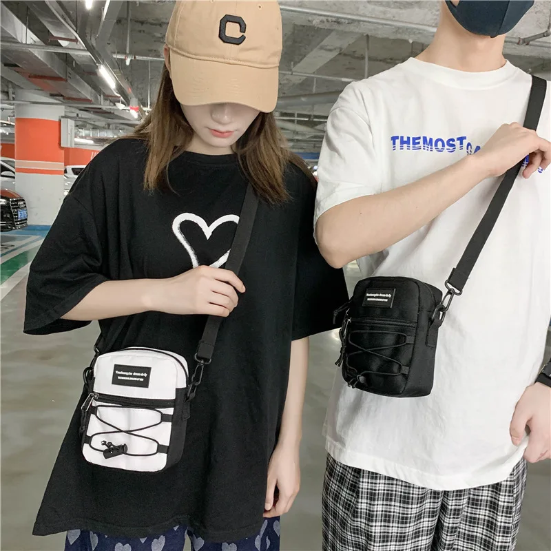 Women ins Canvas retro personality shopulder bag men drawstring letter student messenger bag Japanese Harajuku small bag
Women ins Canvas retro personality shopulder bag men drawstring letter student messenger bag Japanese Harajuku small bag