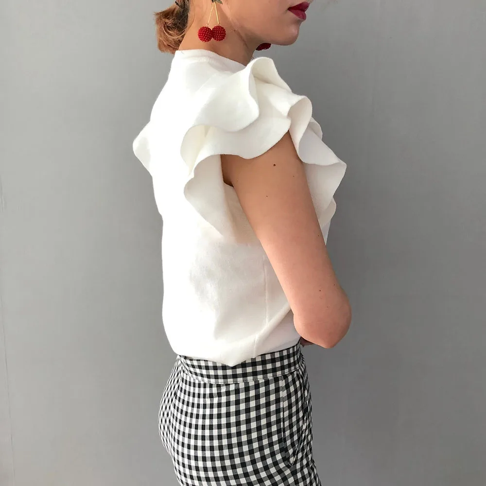 2020 Korean Summer Ruffles Short Sleeve Women T Shirt Knitted Tops Tees Female Chic Solid Loose T-Shirt Loose Elegant Pullover
2020 Korean Summer Ruffles Short Sleeve Women T Shirt Knitted Tops Tees Female Chic Solid Loose T-Shirt Loose Elegant Pullover