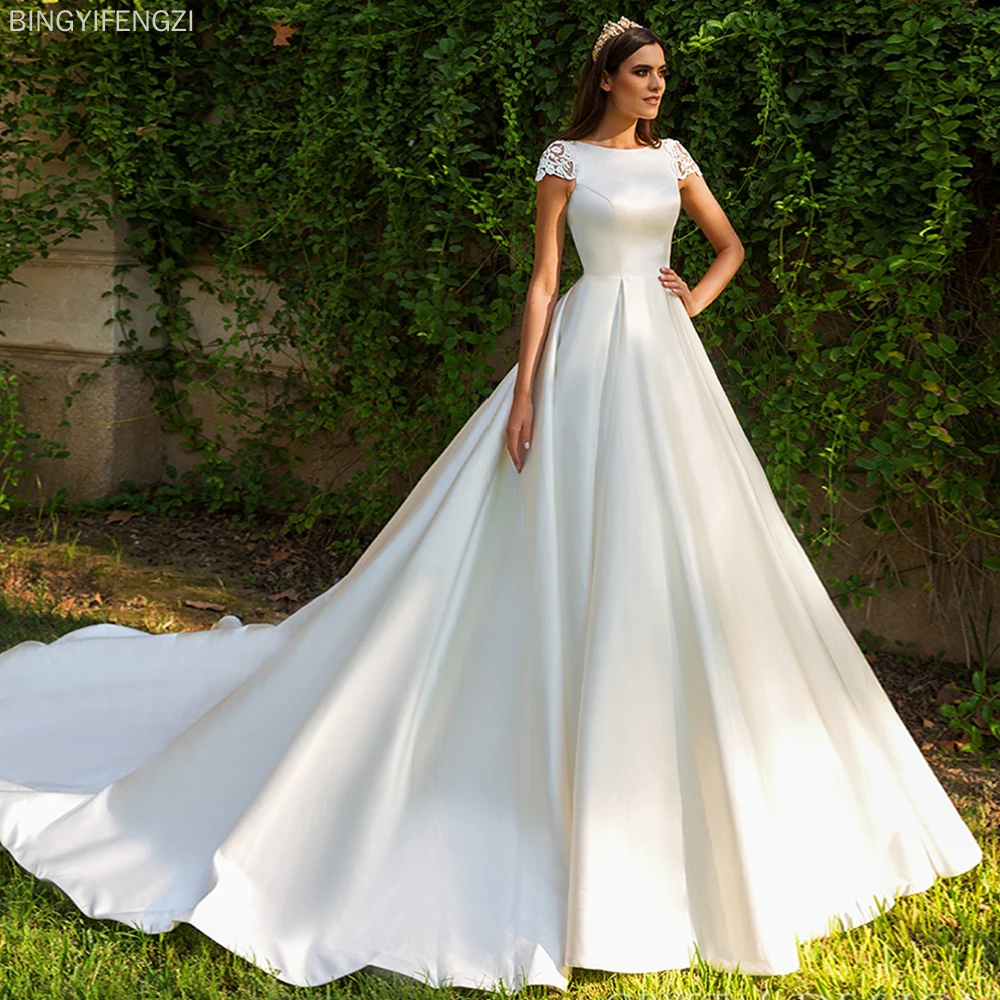 

Bridal Dresses Satin Wedding Gowns Vestidos De Boda New Beading Appliques Illusion Back France Listing Short Sleeve Sleeve Style