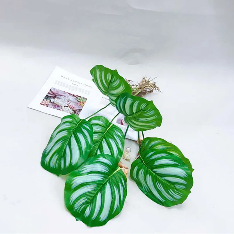 80 cm 7fork Artificial Monstera Plants Green Plastic Palm Tree Branch Indoor DIY Landscaping Hotel Office Home Decor Accessor
80 cm 7fork Artificial Monstera Plants Green Plastic Palm Tree Branch Indoor DIY Landscaping Hotel Office Home Decor Accessor