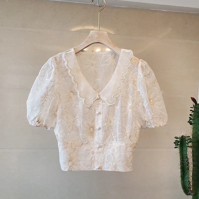 French Sweet Beaded Doll Collar Embroidered Shirt Fashion Puff Sleeve V-neck Slim Short Women Tops 2021 Summer Elegant Blouse
French Sweet Beaded Doll Collar Embroidered Shirt Fashion Puff Sleeve V-neck Slim Short Women Tops 2021 Summer Elegant Blouse