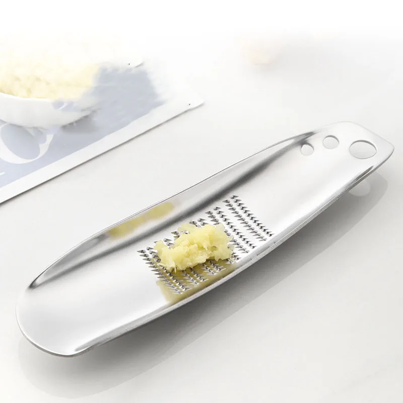 Manual Garlic Grinder Zester Gadgets Multi-function Small Grater Grinding masher Vegetables tools stainless steel Kitchen gadget
Manual Garlic Grinder Zester Gadgets Multi-function Small Grater Grinding masher Vegetables tools stainless steel Kitchen gadget