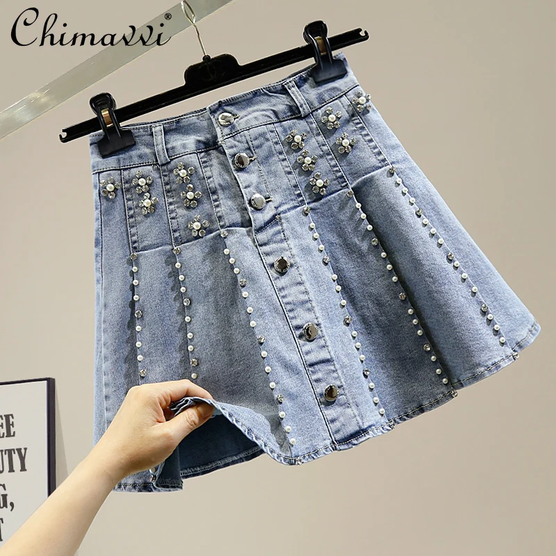 Beads Diamond Single Breasted A Line Jean Skirt Women Korean Style Stretch Denim Pleated Skirt Lady High Waist Blue Short Skirt
Beads Diamond Single Breasted A Line Jean Skirt Women Korean Style Stretch Denim Pleated Skirt Lady High Waist Blue Short Skirt