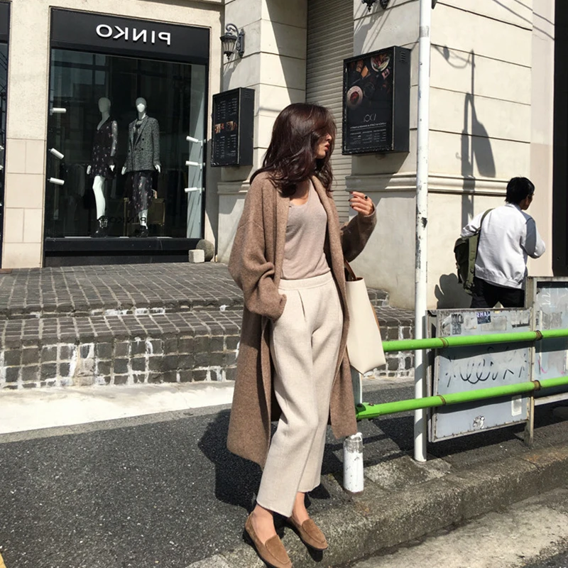 2020 Loose Knit Woolen Cardigan Sweater Fashion Long Sleeve Warm Solid Color Women Casual Coats Autumn Long Cardigan Outerwear
2020 Loose Knit Woolen Cardigan Sweater Fashion Long Sleeve Warm Solid Color Women Casual Coats Autumn Long Cardigan Outerwear