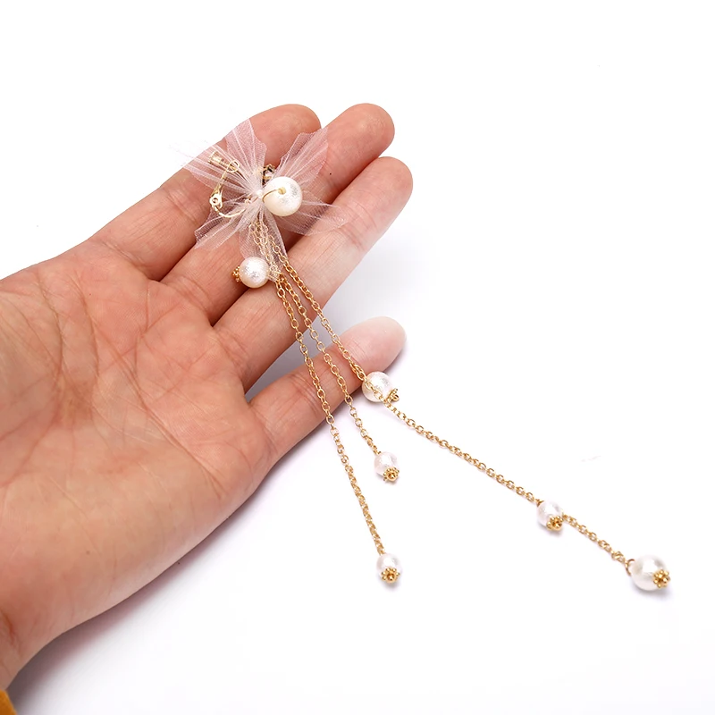 New Fashion Women Wild Pearl Tassel Earrings Retro Wedding Party Ear clip Women Earrings Korea Style
New Fashion Women Wild Pearl Tassel Earrings Retro Wedding Party Ear clip Women Earrings Korea Style
