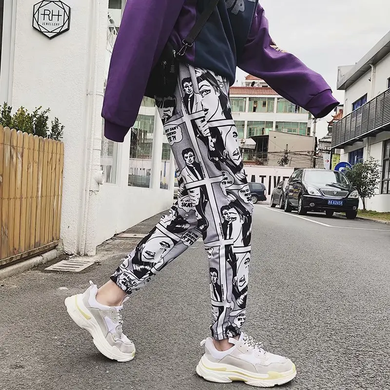 Man's Fashion Cartoon Comics Print Pants Loose Sport Casual Drawstring Elastic High Waist Joggers Pants Hip Hop Cropped Trousers
Man's Fashion Cartoon Comics Print Pants Loose Sport Casual Drawstring Elastic High Waist Joggers Pants Hip Hop Cropped Trousers