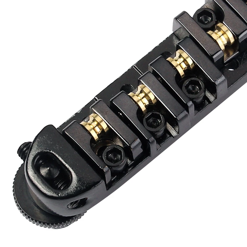 Brass Roller Adjustable Saddle Tune-O-Matic Zinc Alloy and Brass Rollers Bridge for Lp Electric Guitar
Brass Roller Adjustable Saddle Tune-O-Matic Zinc Alloy and Brass Rollers Bridge for Lp Electric Guitar