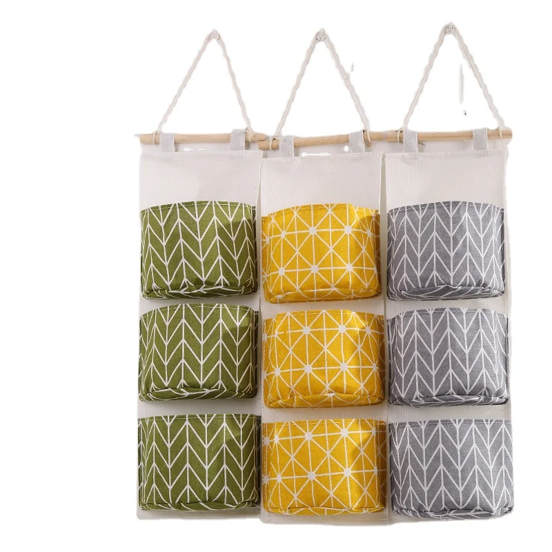 Creative cotton and linen storage hanging bag 3 layer hanging pocket cloth art door sundries storage bag storage bag
Creative cotton and linen storage hanging bag 3 layer hanging pocket cloth art door sundries storage bag storage bag