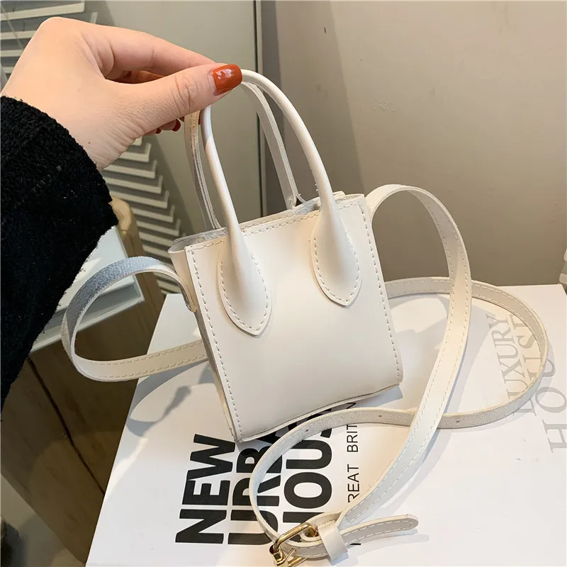 2021 New Mini Small Square Female Bag Fashion PU Leather Coin Purse One Shoulder Messenger Bags Black Handbag 
2021 New Mini Small Square Female Bag Fashion PU Leather Coin Purse One Shoulder Messenger Bags Black Handbag