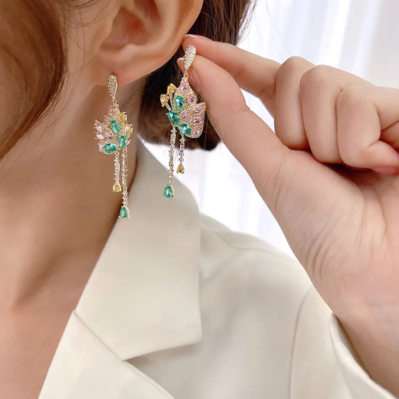 AJC New style woman color zirconium eardrop charm ethnic wind acts the role of long tassel butterfly earring for woman
AJC New style woman color zirconium eardrop charm ethnic wind acts the role of long tassel butterfly earring for woman