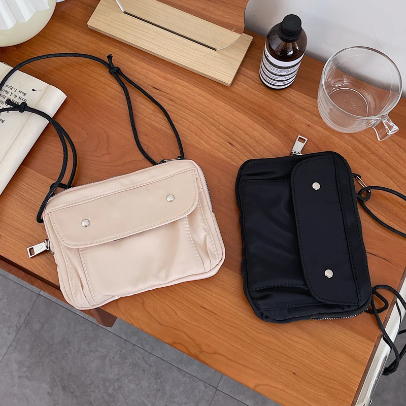 2021 Korean Mini Zipper Bags Women‘s Bag Crossbody Phone Bag Ladies Shoulder Bag Casual Female Nylon Bag Thin Strap Whole Sale
2021 Korean Mini Zipper Bags Women‘s Bag Crossbody Phone Bag Ladies Shoulder Bag Casual Female Nylon Bag Thin Strap Whole Sale