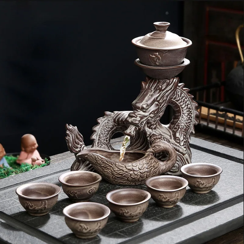 9 pcs / set Ceramics Lazy Man Tea Set Portable stone grinding semi-automatic porcelain Dragon teaware ceremony supplies
9 pcs / set Ceramics Lazy Man Tea Set Portable stone grinding semi-automatic porcelain Dragon teaware ceremony supplies