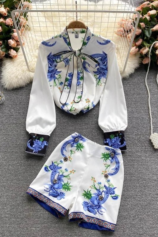 2021 Summer New Young Lace-up Bow Collar Women's Shirt All-Matching Printed Wide Leg Shorts Two-Piece Set Business Suit
2021 Summer New Young Lace-up Bow Collar Women's Shirt All-Matching Printed Wide Leg Shorts Two-Piece Set Business Suit