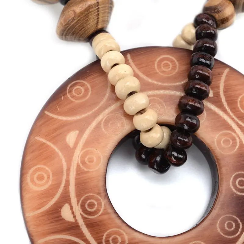 Handmade Ethnic Sun Lines Hollow Round Natural Wood Ring Exotic Beaded Pendant Necklace Fashion Jewelry Unisex
Handmade Ethnic Sun Lines Hollow Round Natural Wood Ring Exotic Beaded Pendant Necklace Fashion Jewelry Unisex