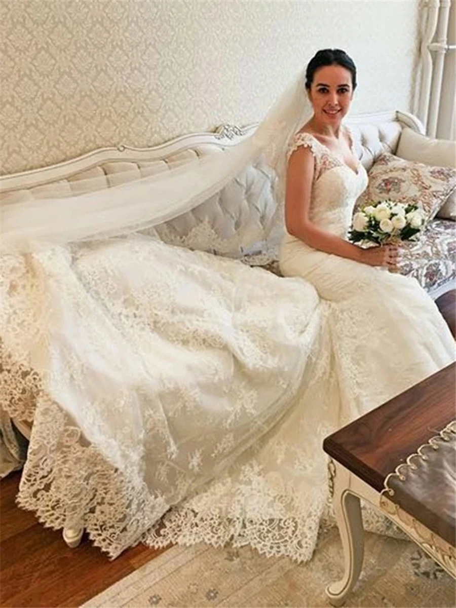Elegant Full Lace Appliqued Mermaid Wedding Dress For Women Sexy Backless Cap Sleeve Beach Court Train Customize Bridal Dresses
Elegant Full Lace Appliqued Mermaid Wedding Dress For Women Sexy Backless Cap Sleeve Beach Court Train Customize Bridal Dresses