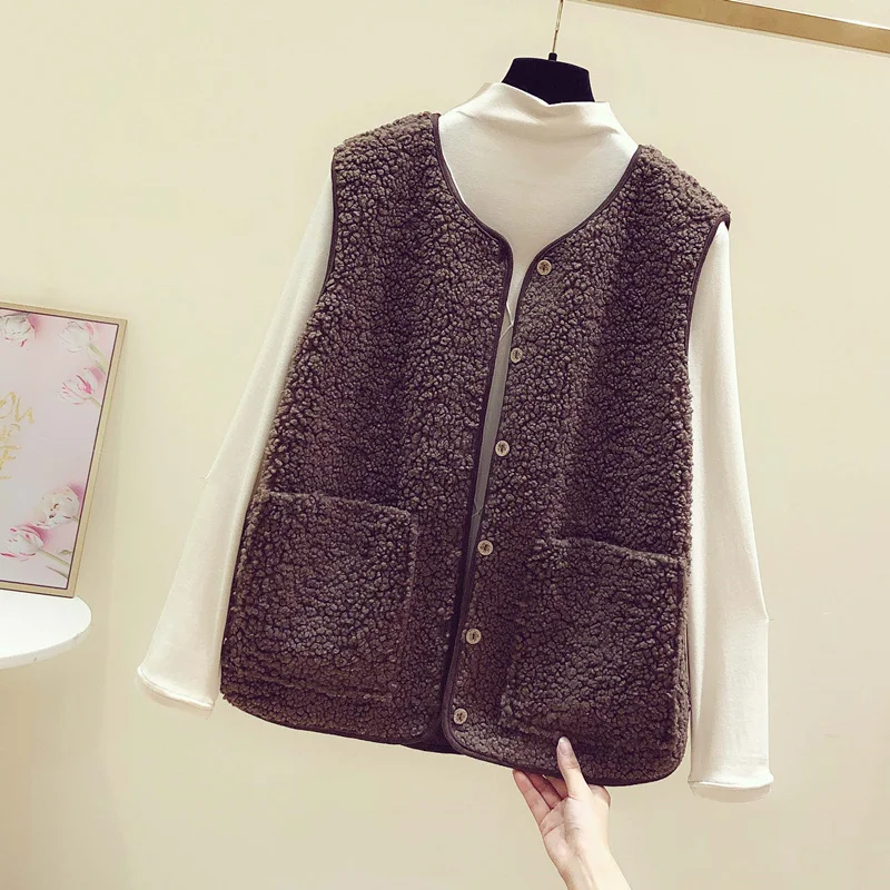 New 2020 Spring Chic Lamb Fur Coat Women Warm Loose V-Neck Sleeveless Vest Cardigan Jacket Solid fashion Casual Vest Female
New 2020 Spring Chic Lamb Fur Coat Women Warm Loose V-Neck Sleeveless Vest Cardigan Jacket Solid fashion Casual Vest Female