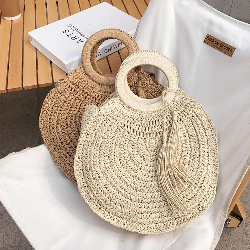 Hand-woven Round Women's Handbags Bohemian 2021 Summer New Tassel Shoulder Bags Ladies Straw Beach Tote Bags Travel Weaving Bag 
Hand-woven Round Women's Handbags Bohemian 2021 Summer New Tassel Shoulder Bags Ladies Straw Beach Tote Bags Travel Weaving Bag
