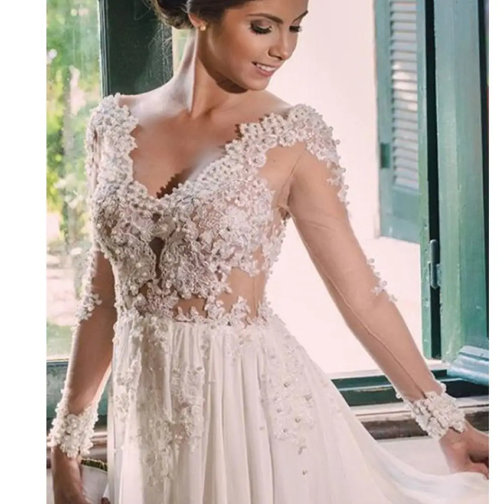 Romantic White Chiffon Pearls Beading Vestidos De Noiva Illusion Long Sleeves Backless Deep V-neck Court Train Wedding Dresses 
Romantic White Chiffon Pearls Beading Vestidos De Noiva Illusion Long Sleeves Backless Deep V-neck Court Train Wedding Dresses